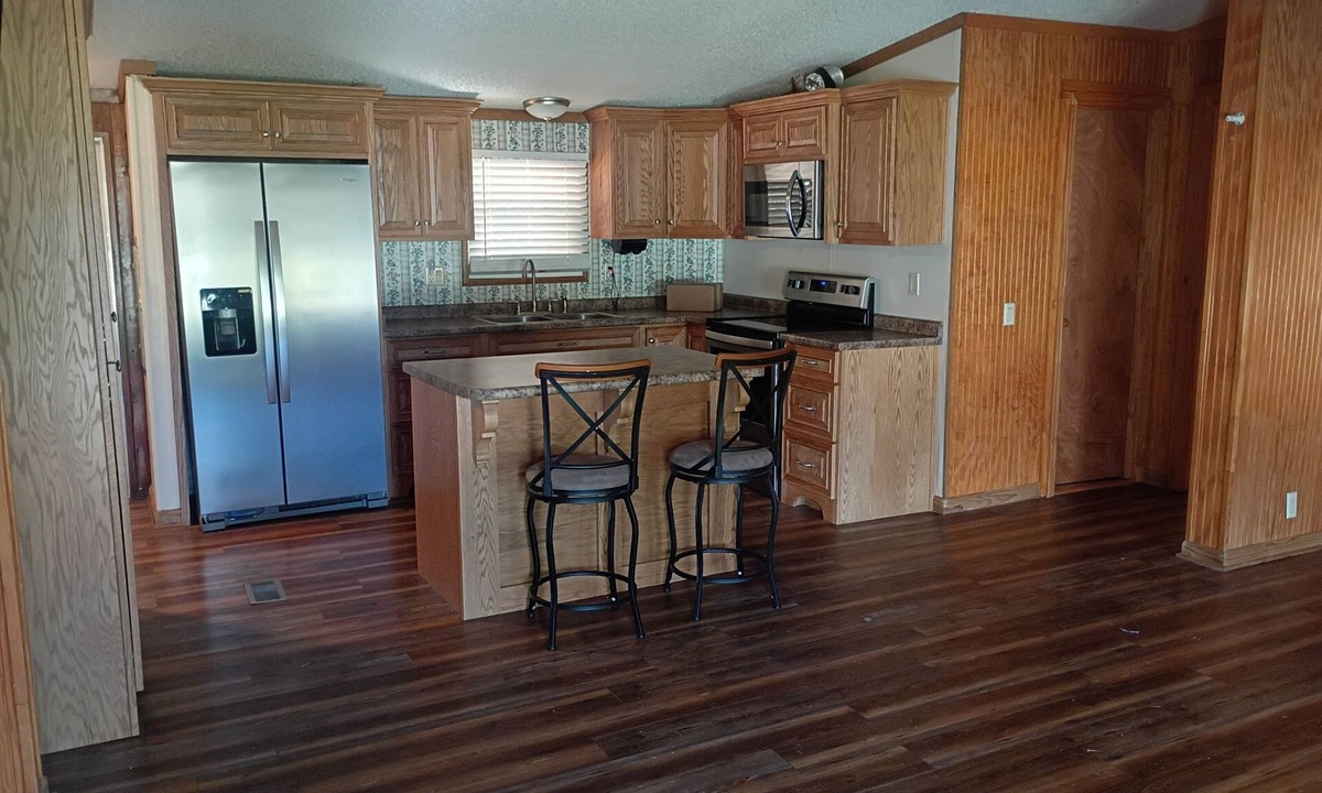 Matthews House | 3-Bedroom 2-bath Home – Covered Porch & Deck, Fenced front Yard, Carport, AC!”