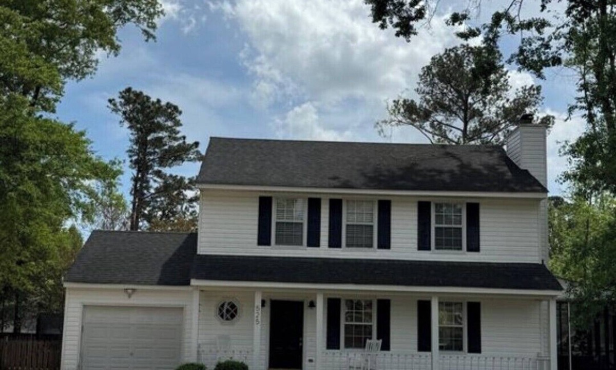 Martinez House | 3-bedroom house with back patio and screened in porch.