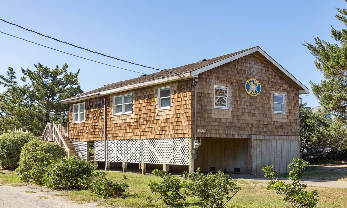 Ocean Isle Estates House | 4 Salty Paws 147: Semi-oceanfront, dog-friendly, hot tub & shared pool