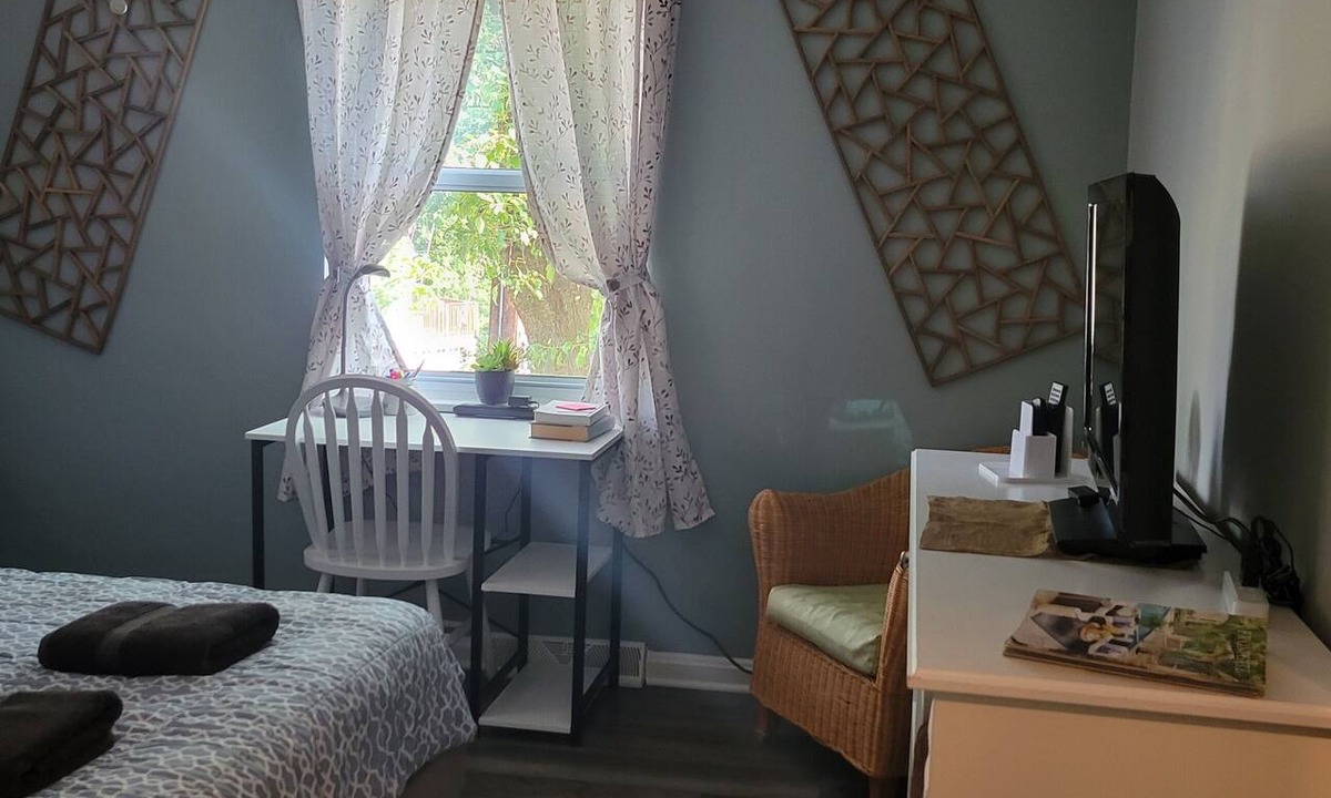 Reading House | A beautiful and cozy yellow house. The house is divided into 2 separate apartments.