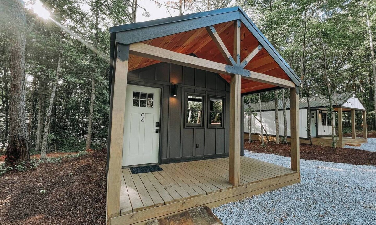 Hartwell RV Rental | Cabin #2: One king-size bed with a full kitchen for cooking and a large gravel parking pad beside the cabin for easy boat trailer storage.