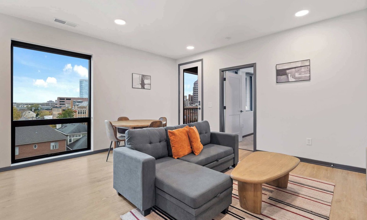 Lockerbie Square Apartment | CozySuites Mass with lounge and roof deck #27