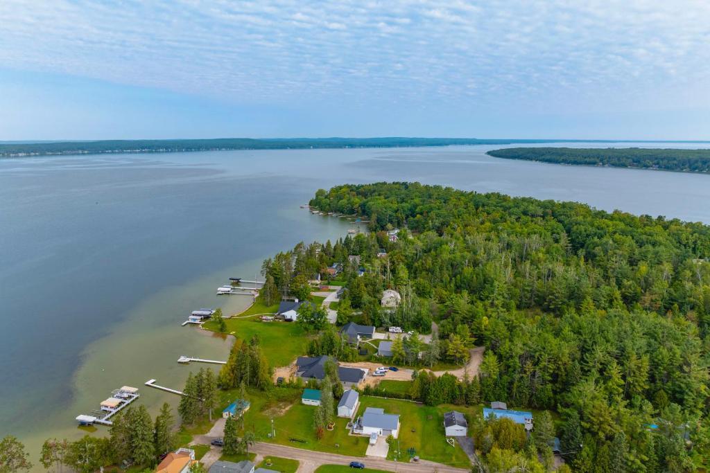 Indian River House | Fall Hikes & Fire Pit: Pet-Friendly MI Retreat