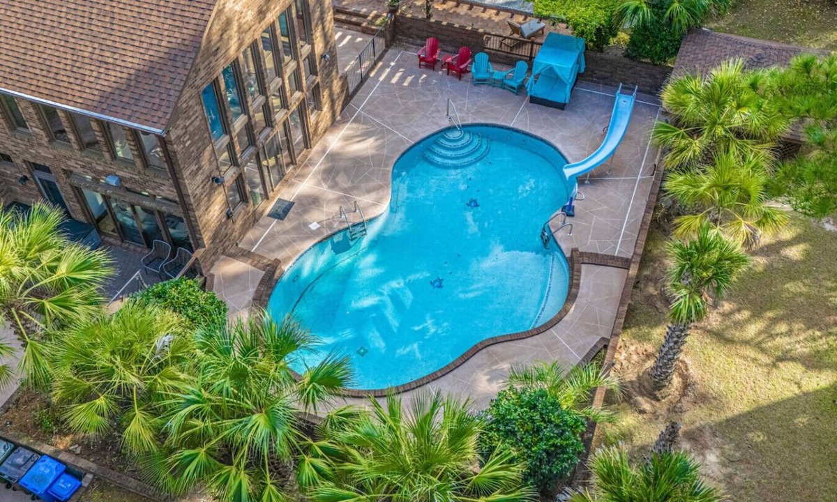 Terry Sanford House | Fayetteville Getaway | Pool Pizza Oven Fire Pit