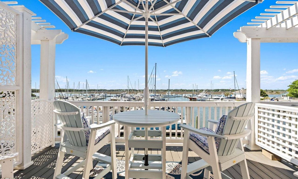 Southport Condo | Lucy's Gift: Spacious balcony overlooking the intercoastal waterway