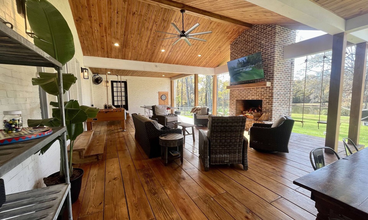 Grovetown House | Masters Rental- Farmhouse with pool, covered patio, & 2 turf greens.