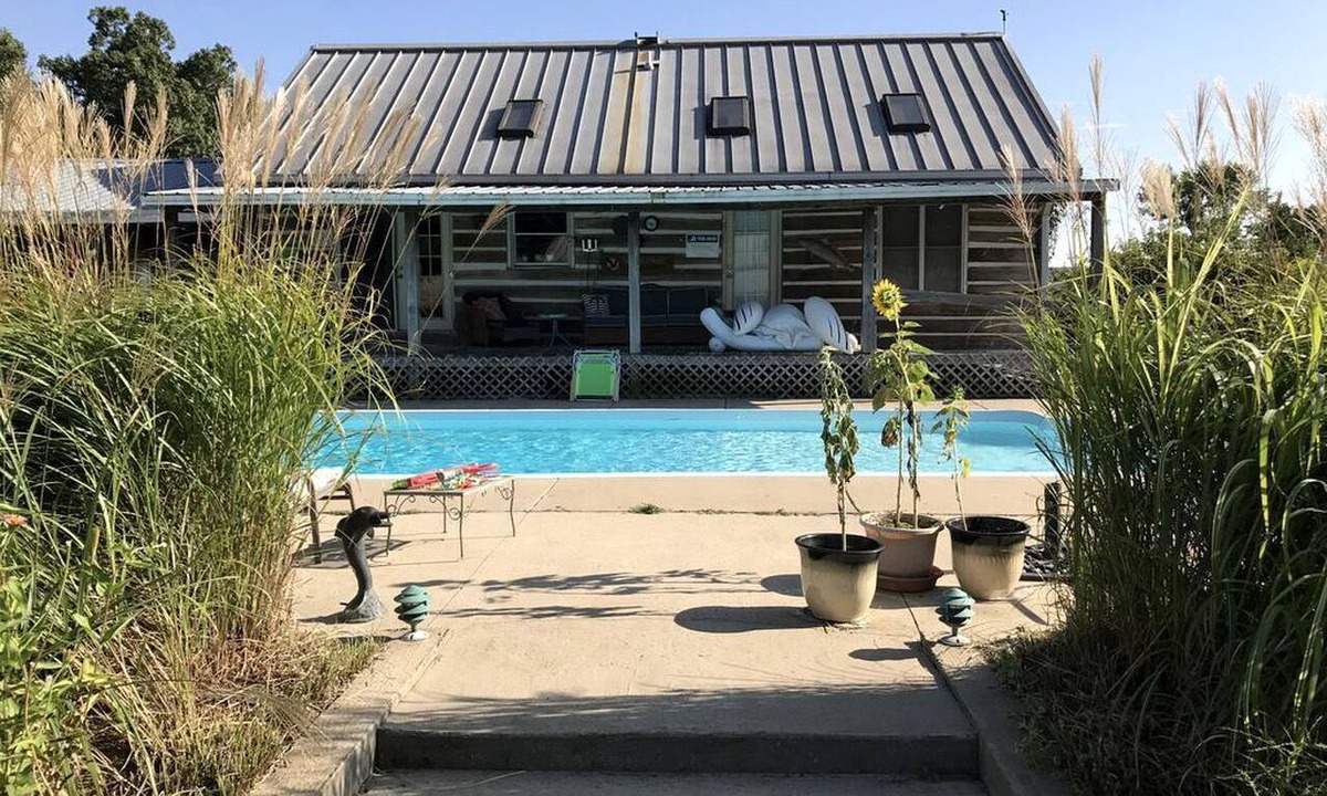 Crofton Cabin | Pet-Friendly Log Cabin with an Outdoor Pool near Crofton, Kentucky