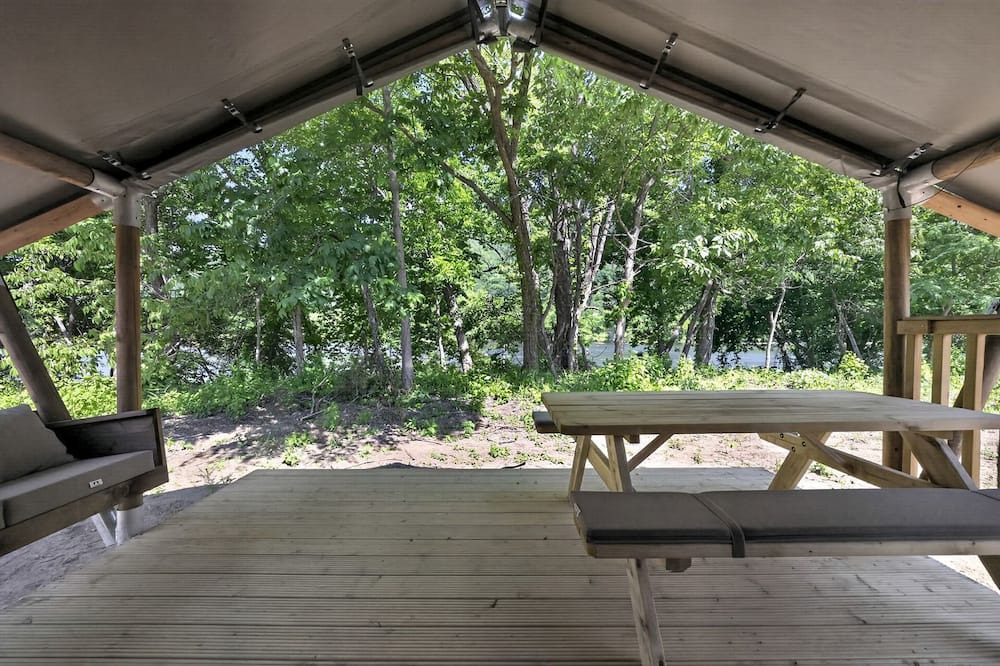 New River RV Rental | Safari Tent Retreat with Riverfront Deck and Nature Stay in Blacksburg, Virginia