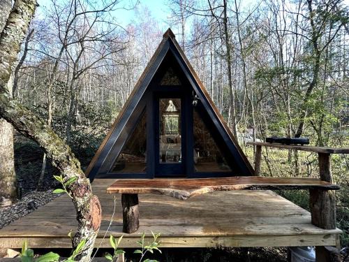 Zirconia Ski Chalet | Secluded Off-Grid Cabin Retreat with Fire Pit & Sauna in Zirconia, North Carolina
