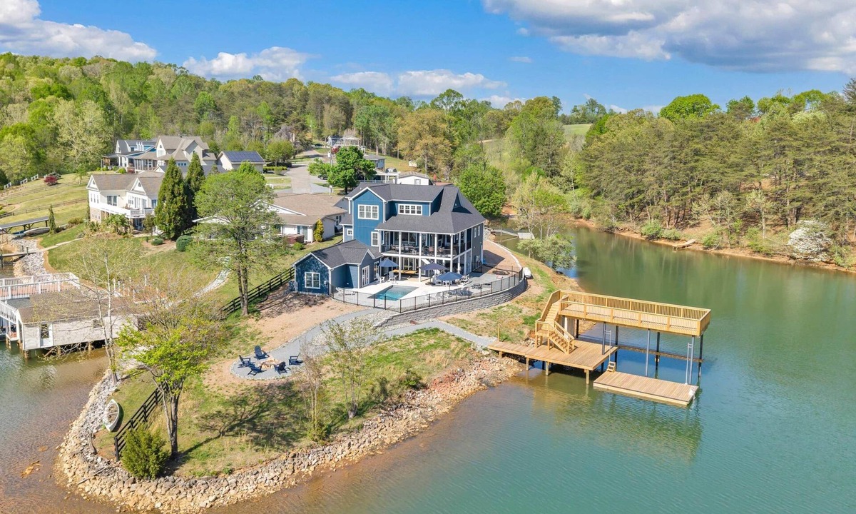 Moneta House | Sunset Point Estate. Luxury w/Covered Porches, Heated Salt Pool, Hot Tub, Dock!