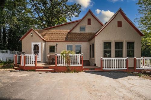 Powers Lake House | Whimsical Historic Getaway Near Golf Skiing and Wisconsin Southern Lakes