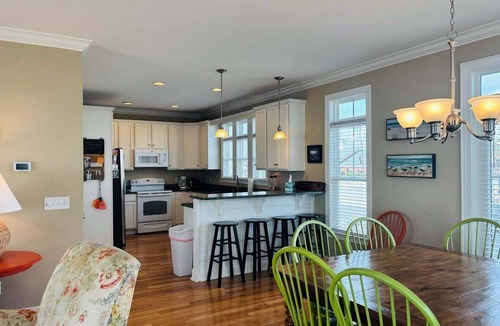 Holden Beach House | 1 Fine Day, a 4BR oceanfront retreat in Holden Beach, sleeps 10 with stunning views.