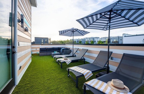 Katie Hill Neighborhood House | 2SBSide Homes 8 Bedrooms, Ultra Heated Rooftop Pools,Arcade,Elevator, Sleeps 23!