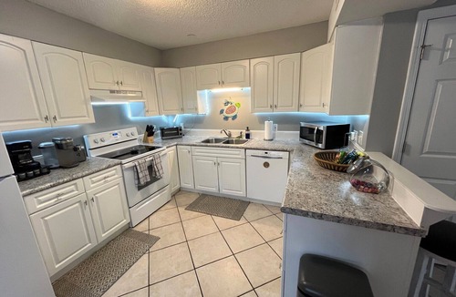 North Carolina Coast Cottage | 30 Sec. to Beach, Sun, Sand & Waves & a Family & Pet Friendly Fenced Backyard
