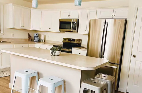 Ocean Isle Estates House | 4-bedroom house in charming Avon with WiFi, AC. Relax and unwind