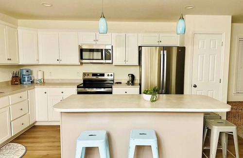 Ocean Isle Estates House | 4-bedroom house in charming Avon with WiFi, AC. Relax and unwind