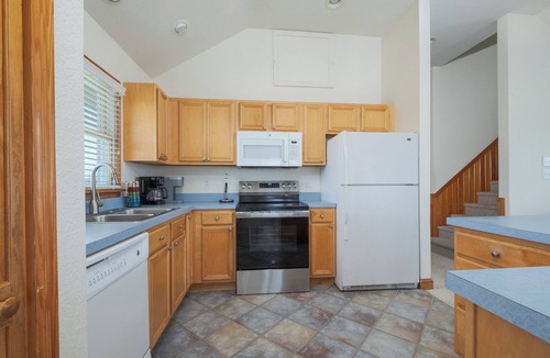 Waves House | 7170- Endless Summer Nights, Dog-Friendly 4BR Waves Escape | Pool & Hot Tub