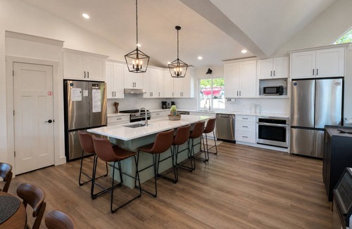 La Follette House | 9BR Theater Room Retreat: Dock Slip in cove, Sleeps 30! EV charger!