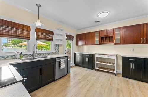 Bay Esplanade House | Bayfront Bliss | 4BR Waterfront Home | Private Dock with Boat Lift, BBQ & Fire Pit