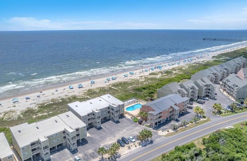 Caswell Beach Apartment | Beach Retreat by Oak Island Accommodations