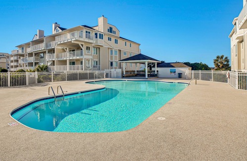 Shell Island Condo | Beachfront condo with ocean views, two pools, tennis, & private balcony