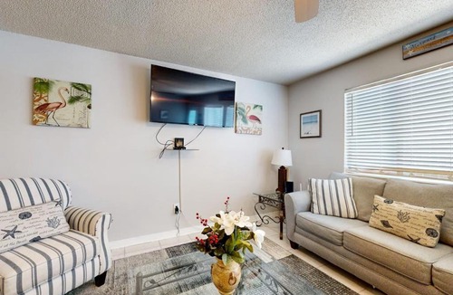 Sugar Beach House | Beachfront townhome with on-site beach access heated pool patio grill AC WD
