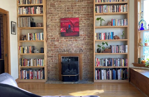 West Town Apartment | Beautiful artist loft immersed in art, plants, and a collection of books