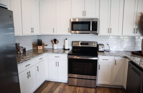 Morehead City House | Beautiful Beau Coast Home w/Pool, Bikes, EV Charger & Dock Access