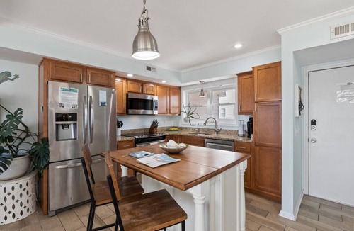 North Carolina Coast Villa | Canal-Front Townhome w/Private Boat Slip, Pool & Beach Access