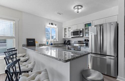 North Carolina Coast House | Carolina Beach Oceanfront Steps to Pier Pool Villa
