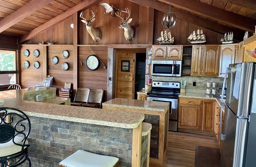 Nancy Cabin | 🤩 Charming Lake Side Retreat perched above scenic Faubush Creek.