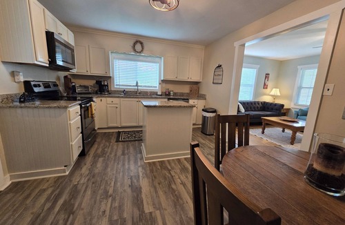 Mineral Bluff Cottage | Charming Mountain Retreat with fire pit, fenced yard, scenic views, and privacy.