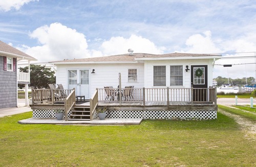 North Carolina Coast Cottage | Classic Beach Cottage with front porch view of water