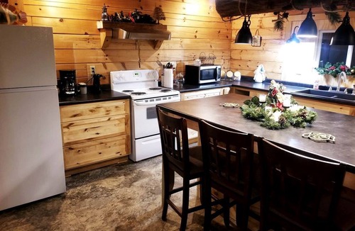 Claxton Cabin | Claxton's Riverfront Family Fun: Cabin Adventures Await