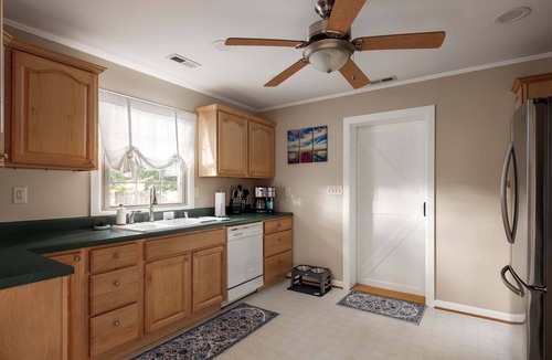 Colonial Beach House | Coastal Grace | Hot Tub, Game Room, & Fenced Yard