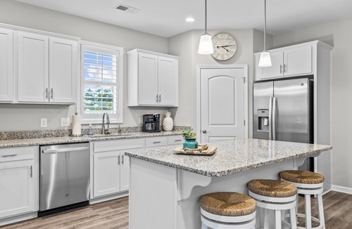 Morehead City House | Coastal townhome with outdoor living, central AC, washer/dryer, & pool access