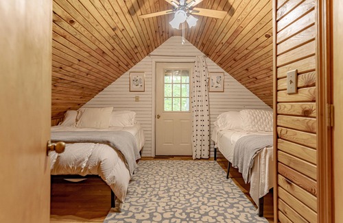 Rogers Cottage | Come relax in our cozy cottage nestled in the woods overlooking Lake Millie.