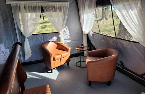 Janesville RV Rental | Comfortable, Pet Friendly Glamping Tent near Lake Charleston in Ashmore, Illinois