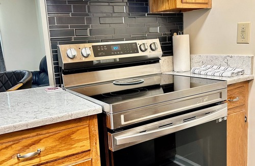 Crossville Apartment | Cozy In-Town Escape Large Yard Close to Everything