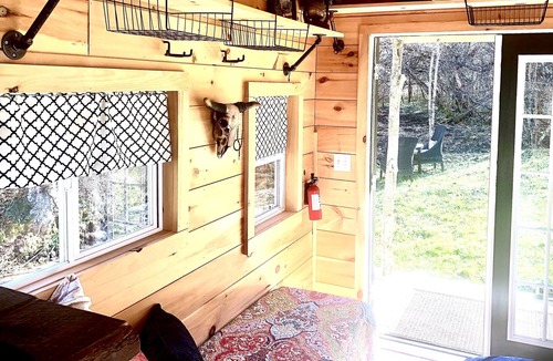 Creston Cabin | Cozy Streamside Tiny Cabin at The Peak