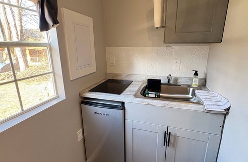 Bryson City Cottage | Cozy studio cottage on beautiful Deep Creek near Great Smoky Mtns. Park