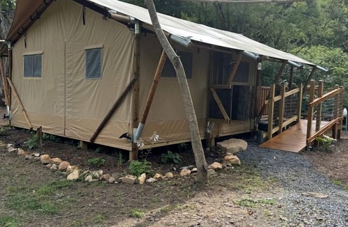 Hillsville RV Rental | Creekfront Safari Tent with Outdoor Bath and Deck in Virginia