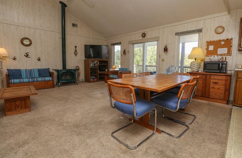 Southern Shores House | Cuckoo's Nest - 4 Bed, 2 Bath dog friendly home with pool, hot tub and tiki bar!