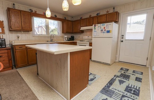 Southern Shores House | Cuckoo's Nest - 4 Bed, 2 Bath dog friendly home with pool, hot tub and tiki bar!