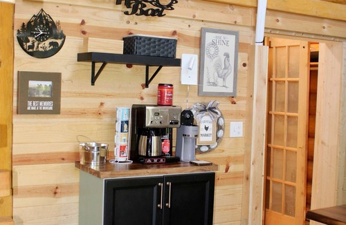 Edray Cabin | Custom Log Home directly along the Greenbrier River sits the River Ridge Retreat