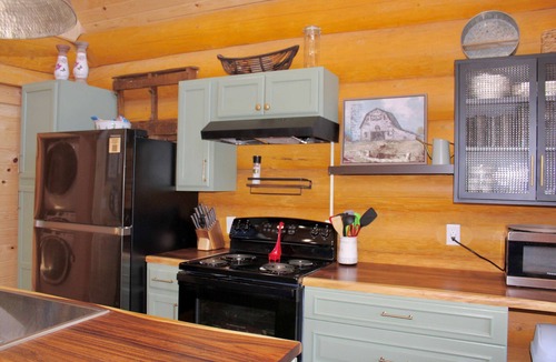 Edray Cabin | Custom Log Home directly along the Greenbrier River sits the River Ridge Retreat