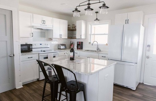 Holden Beach House | Discover coastal charm at Holden Pattern, a spacious 4BR home in Holden Beach.