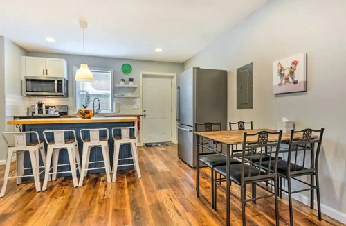 Harold House | Discover Milton charm, steps away from your cozy 2-bedroom retreat.