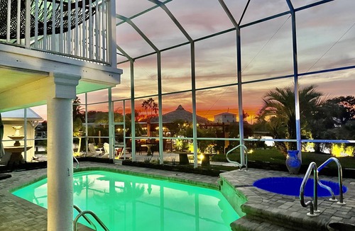 Spring Hill House | Dolphin Point Retreat 50A RV Hookup 300' Waterfront Private Beach & Tiki Bar