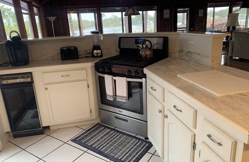 Oriental House | Dragons Island Cottage - Pool, dock and pet friendly